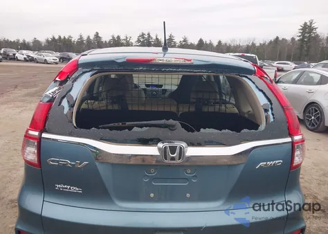 2015 Honda Cr-V Lx z USA, uszkodzony, nr VIN 2HKRM4H35FH690874